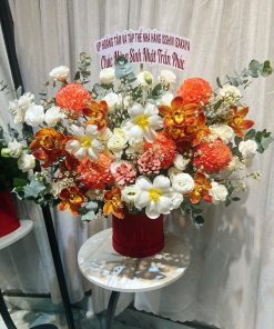 Giỏ hoa tone cam mix sang trọng