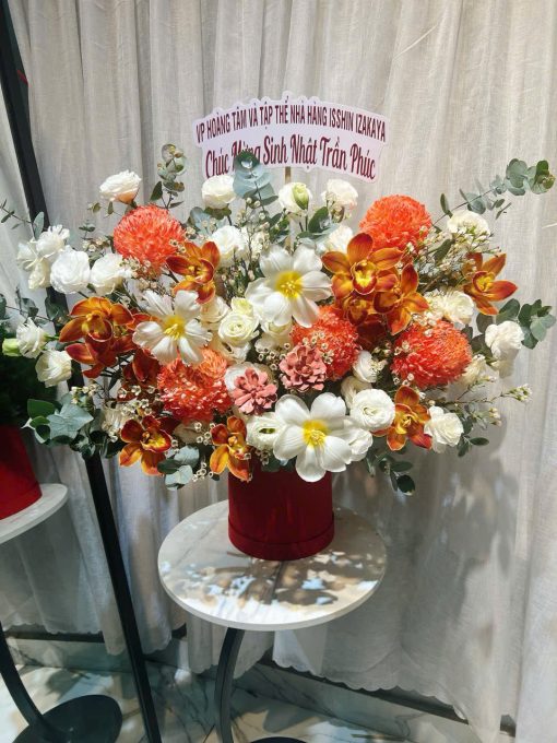Giỏ hoa tone cam mix sang trọng